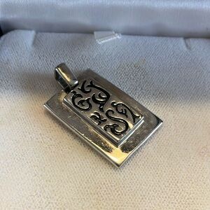 Sterling silver pendant 
1  1/2 inches length 
Just needs chain to wear